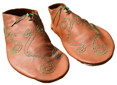 green embroidery in a swirling design