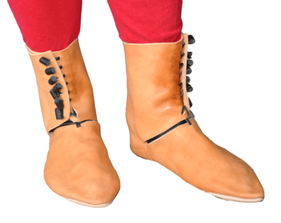 a pair of leather boots with 6 leather toggles for securing them