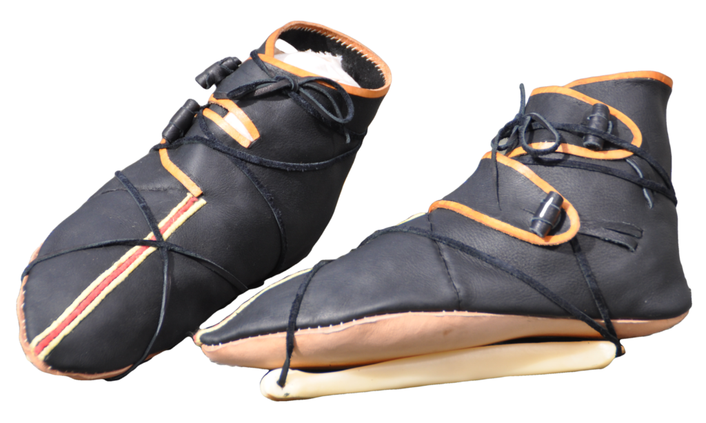 a pair of Viking style shoes laced to bone ice skates